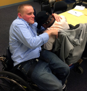 James and Angel hug after the inspiring speech.